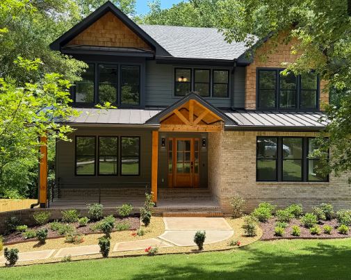 MANAV Capital flagship single-family renovation at Thomas Rd, Decatur, GA — completed two-story craftsman home with landscaped entry.